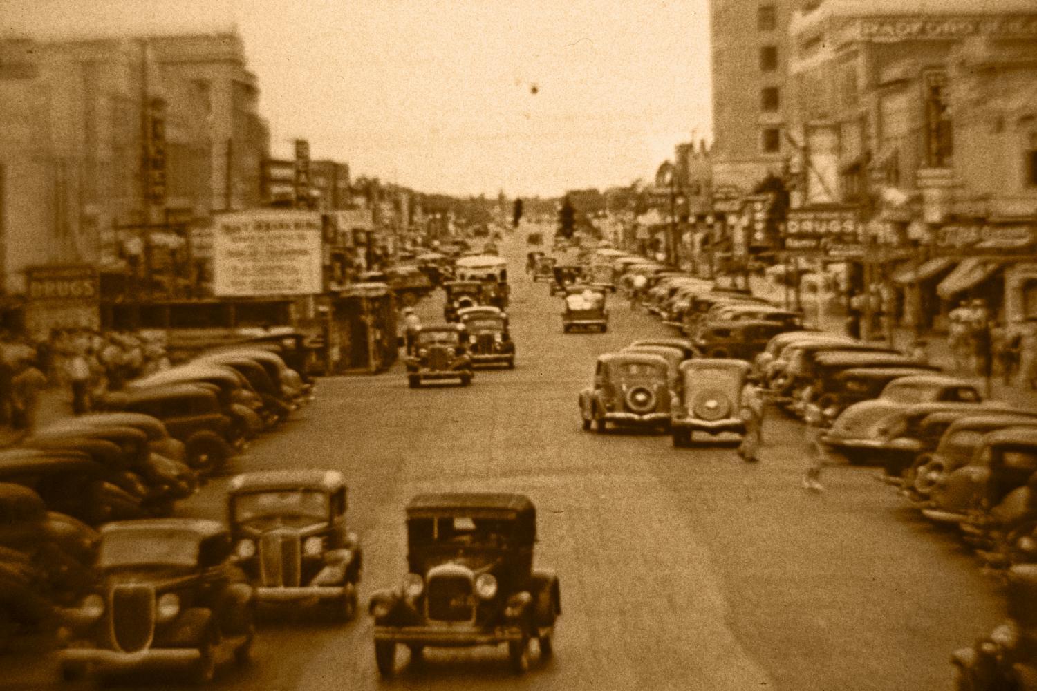 Pine Street in Tyler, 1930s — storefronts and pedestrians on a downtown block